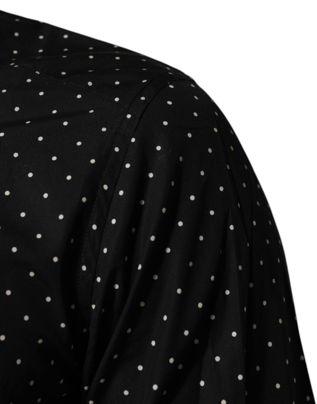 Chemise formelle noire à pois blancs en coton Dolce & Gabbana pour homme, avec détails dorés, vue de face.