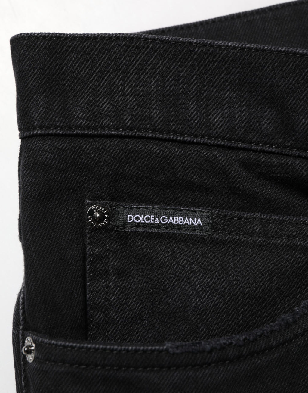 Pantalon homme en denim noir Dolce & Gabbana, coton régulier, style classique et coupe ajustée.