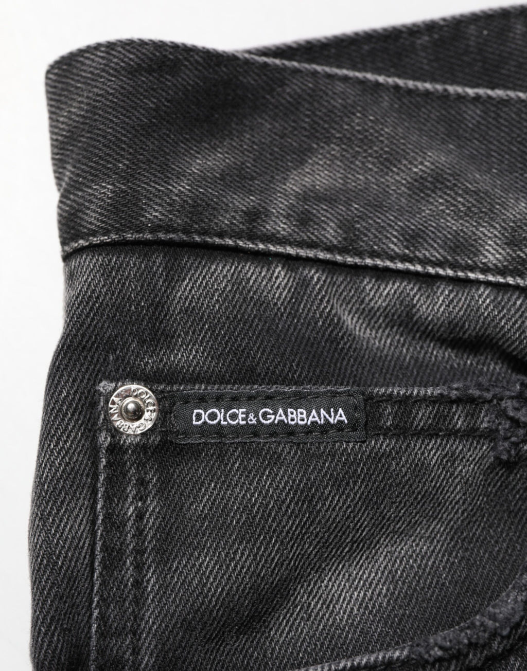 Jeans homme Dolce & Gabbana noirs à effet marbré, coupe droite en denim, détails stylés et tendance.