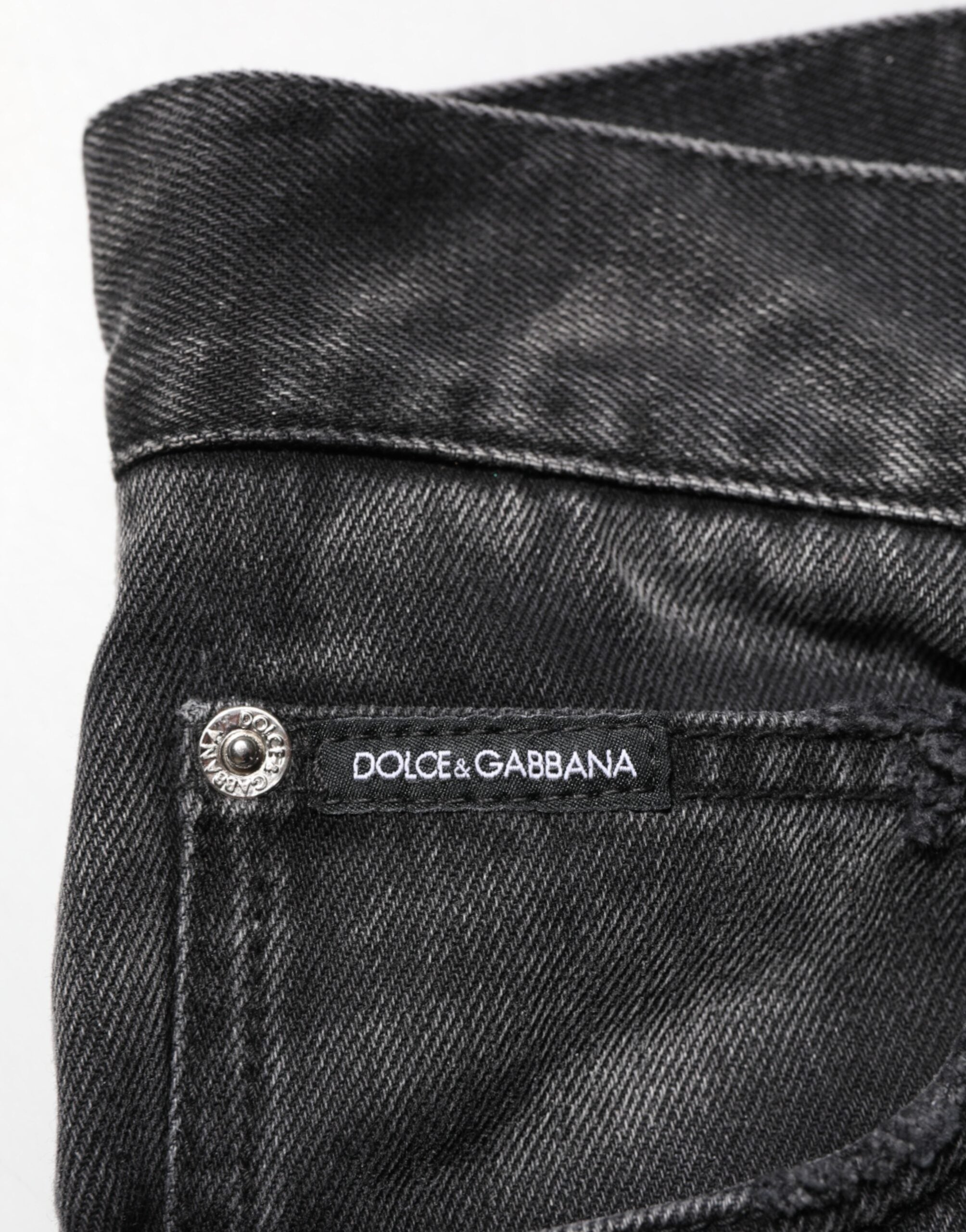 Jeans homme Dolce & Gabbana noirs à effet marbré, coupe droite en denim, détails stylés et tendance.