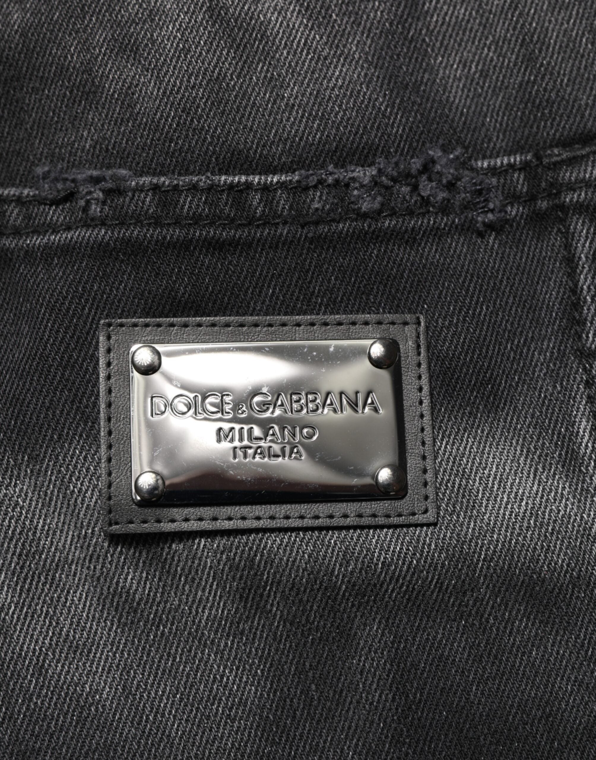 Jeans homme Dolce & Gabbana en denim noir à effet marbré, coupe droite, style élégant et moderne.