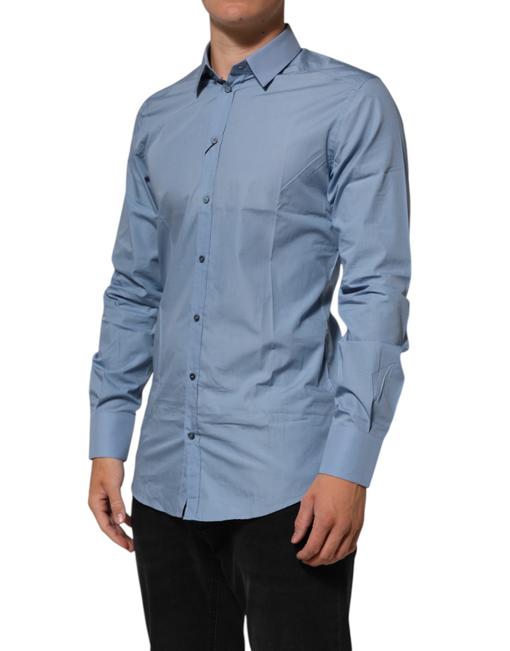 Chemise formelle en coton bleu Dolce & Gabbana avec col, détail or, vue de face.