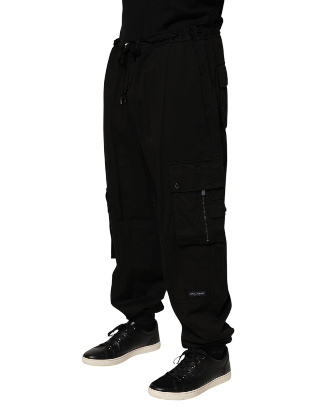 Pantalon jogger cargo en coton noir de Dolce & Gabbana, style décontracté avec poches et ceinture élastique.