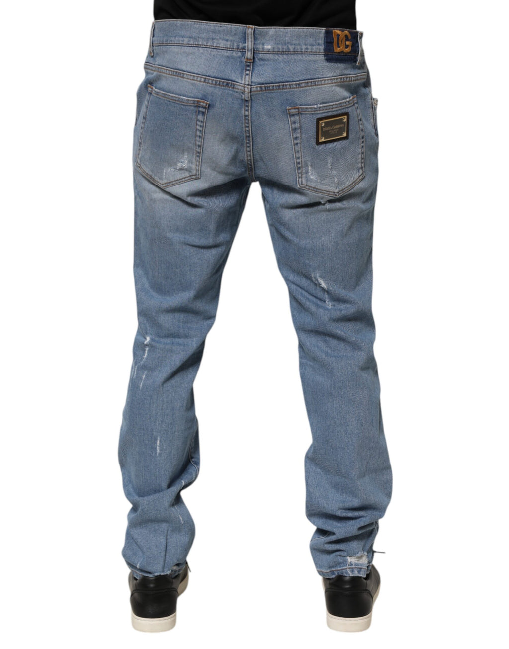 Jeans en denim coton bleu Dolce & Gabbana, coupe slim tachetée, style déchiré, ajusté et tendance.