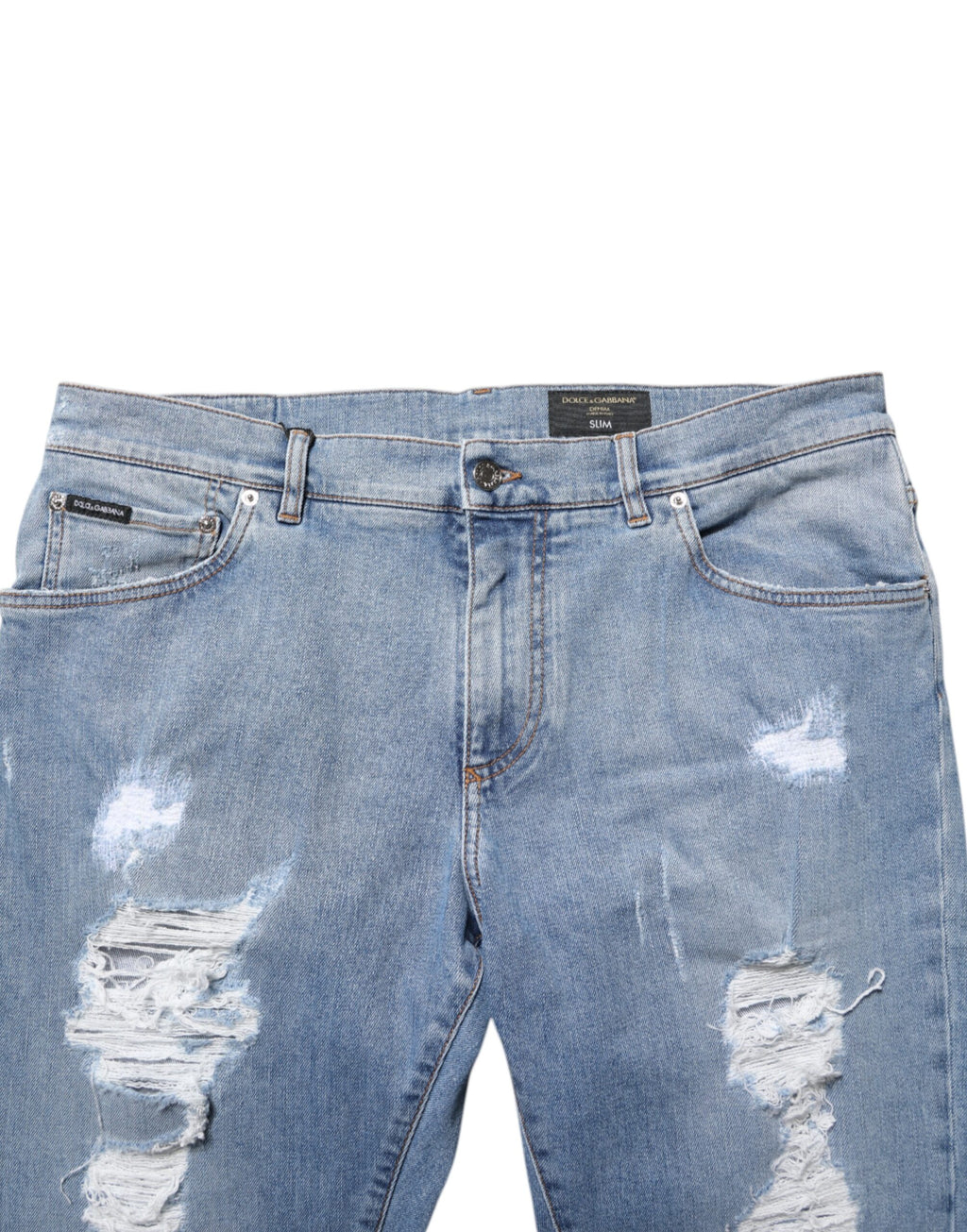 Jeans slim déchirés en coton bleu Dolce & Gabbana, style décontracté avec détails usés et coupe ajustée.