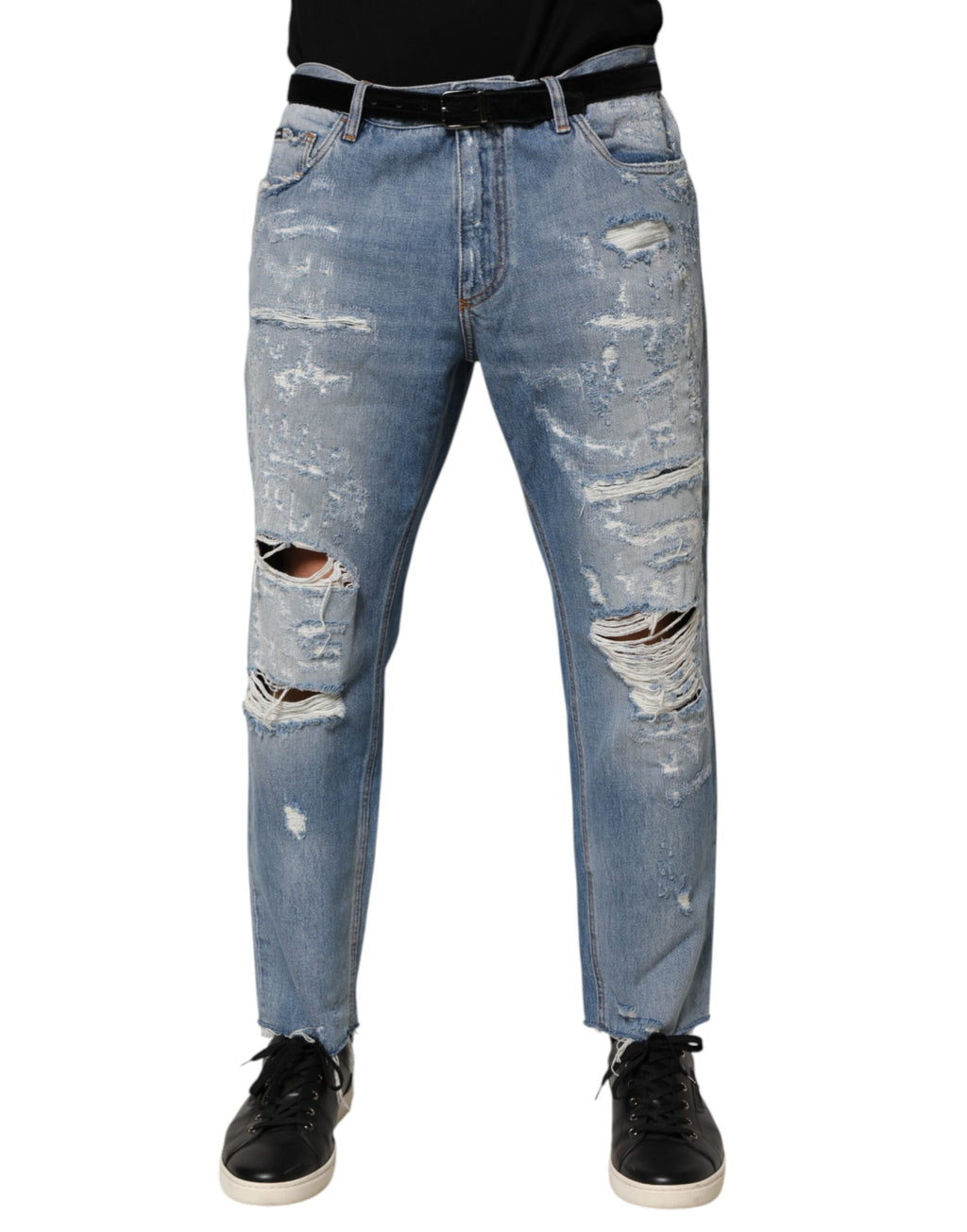 Jeans Dolce & Gabbana en denim bleu déchiré et usé, pantalon décontracté avec style moderne.