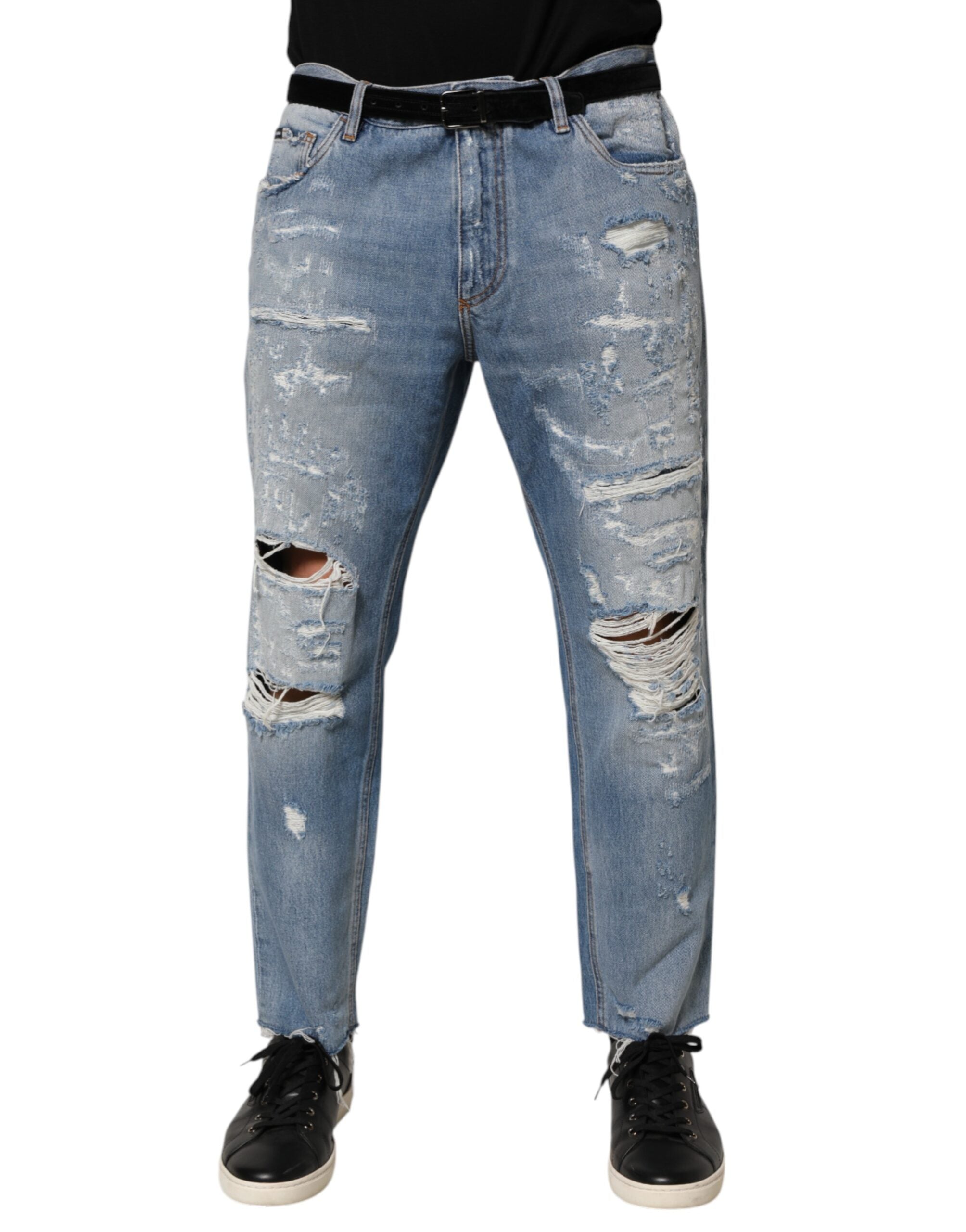 Jeans Dolce & Gabbana en denim bleu déchiré et usé, pantalon décontracté avec style moderne.