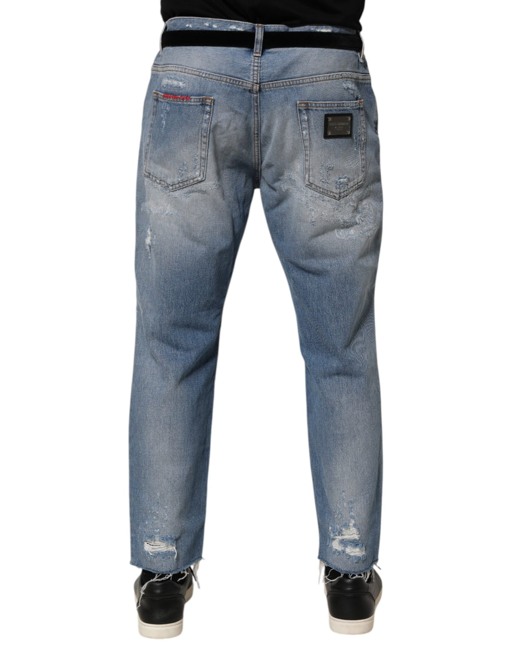 Pantalon en jean déchiré et usé Dolce & Gabbana bleu, style décontracté avec détails distressed, pour homme.