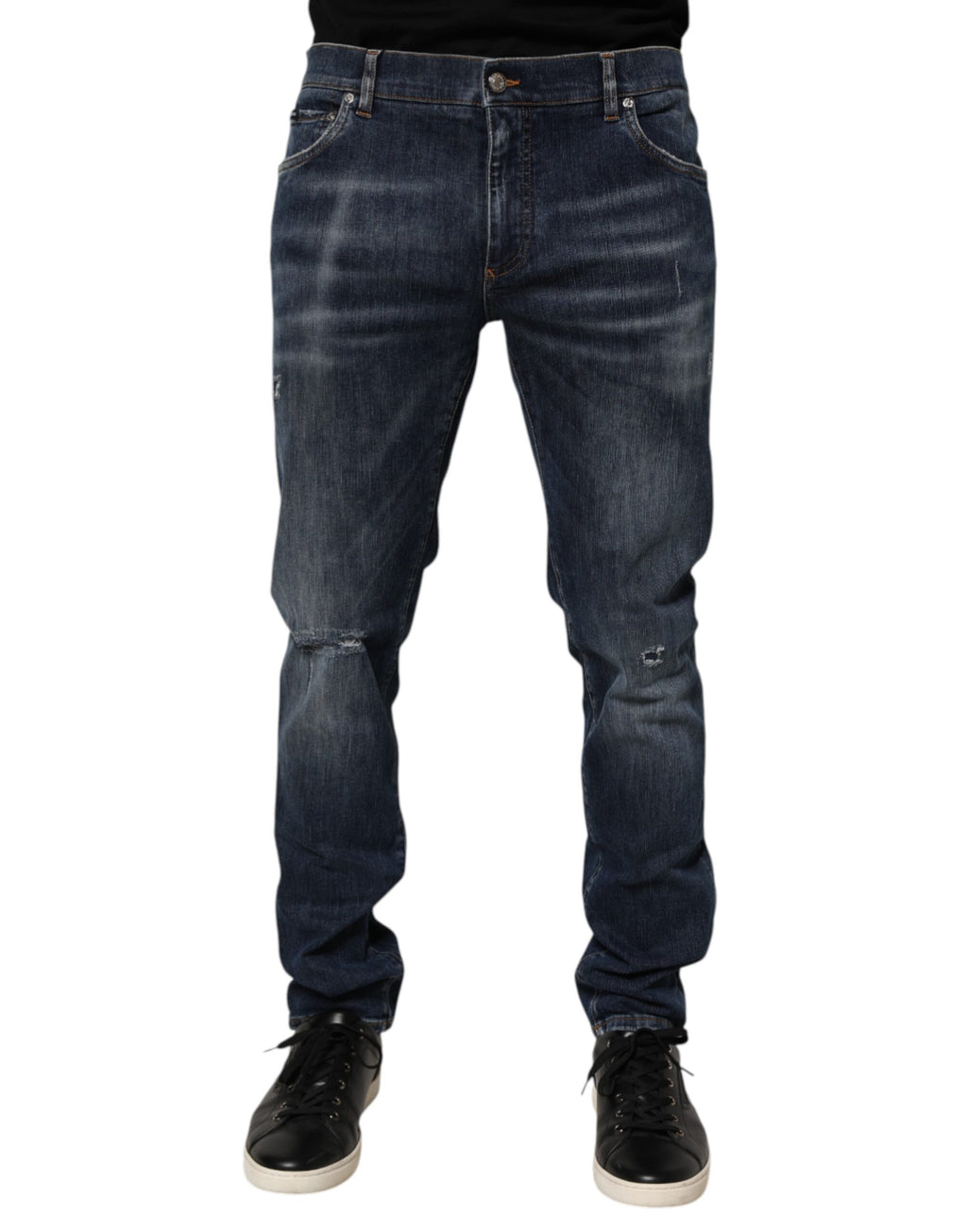 Jeans en jean délavé bleu foncé Dolce & Gabbana, coupe déchirée, style décontracté et tendance.