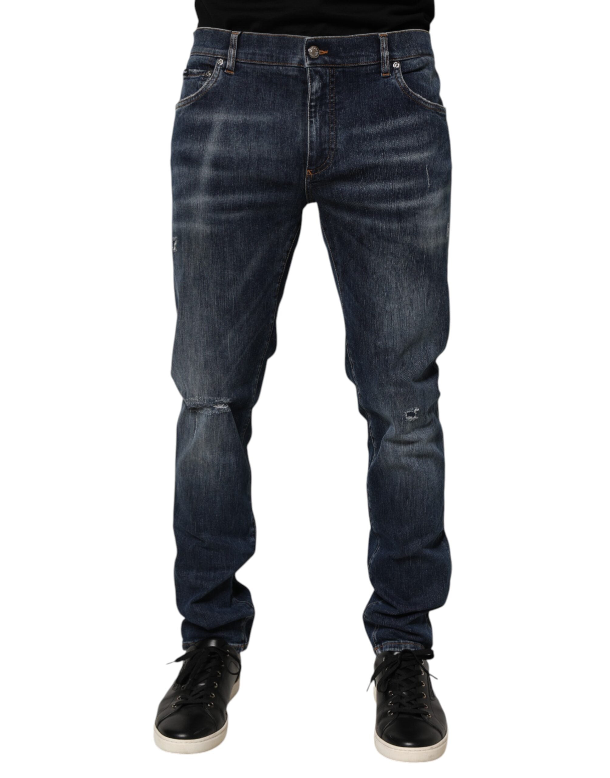 Jeans en jean délavé bleu foncé Dolce & Gabbana, coupe déchirée, style décontracté et tendance.