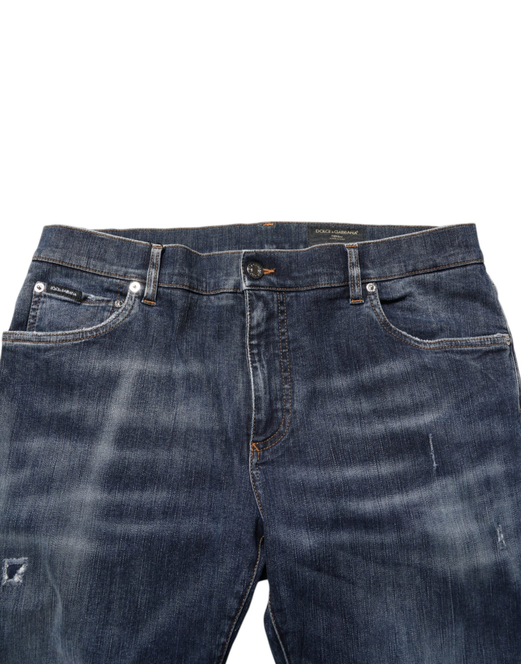 Jeans en denim délavé bleu foncé Dolce & Gabbana, coupe déchirée, style décontracté, visible sur l'image.