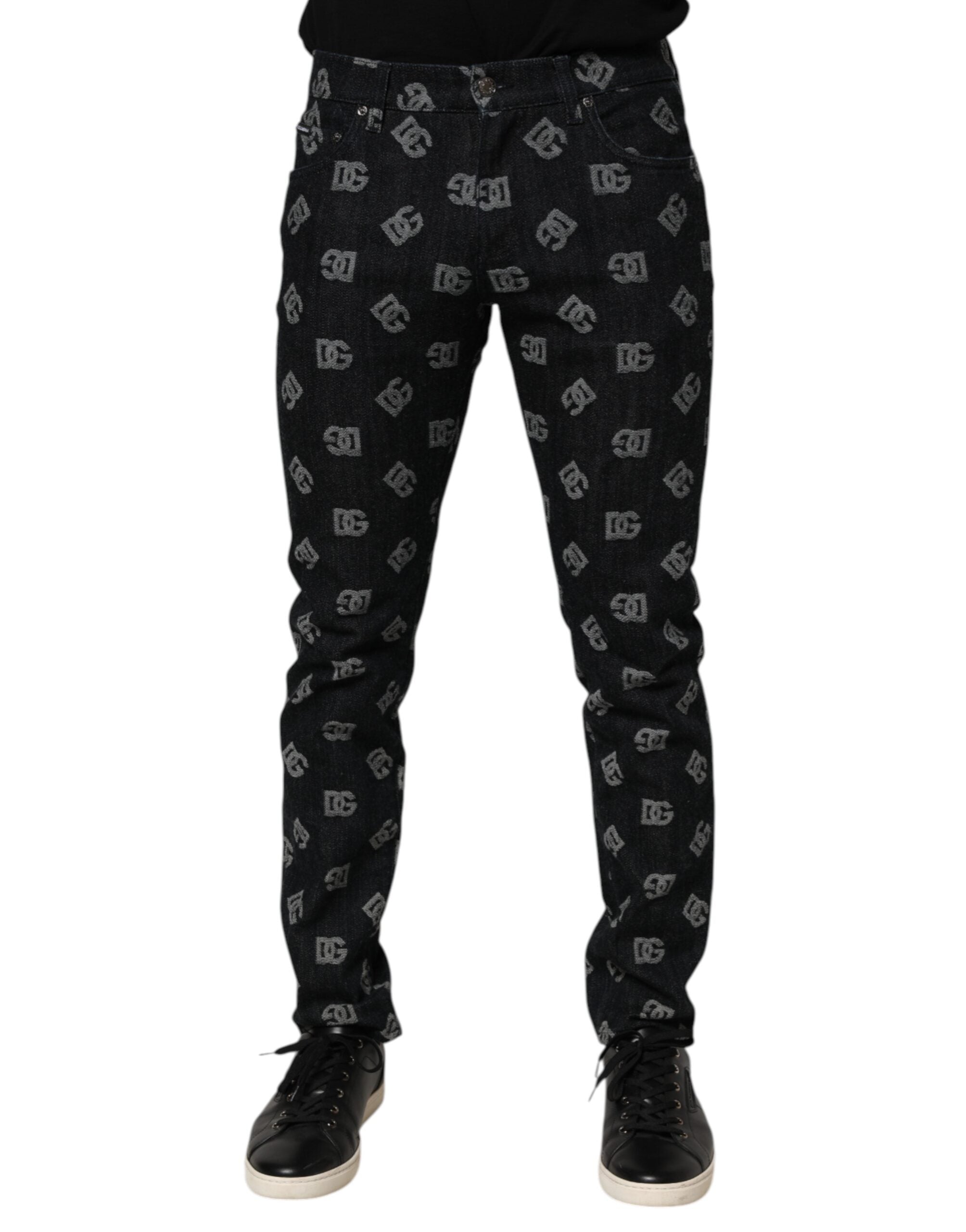 Jeans skinny en denim noir avec monogramme Dolce & Gabbana, en coton, affichant un style élégant et moderne.