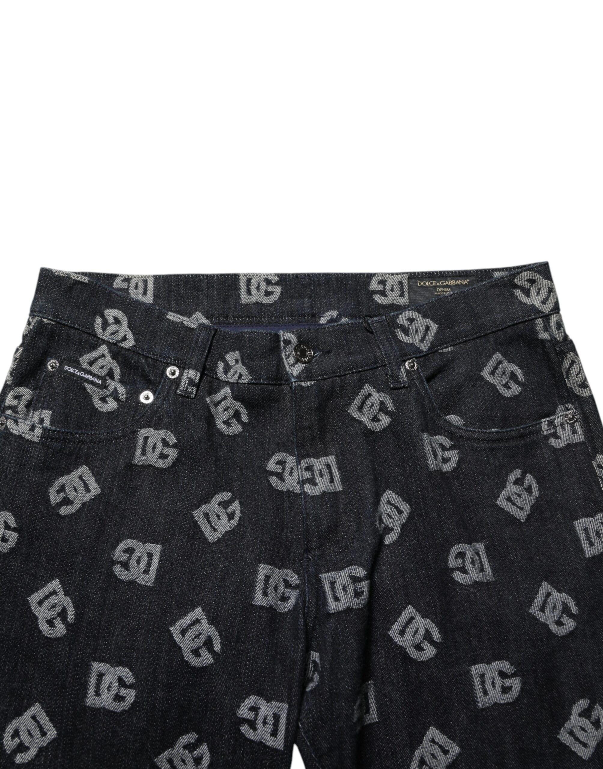 Jeans skinny en coton noir avec monogramme DG de Dolce & Gabbana, denim ajusté et élégant, avec détails de couture visibles.