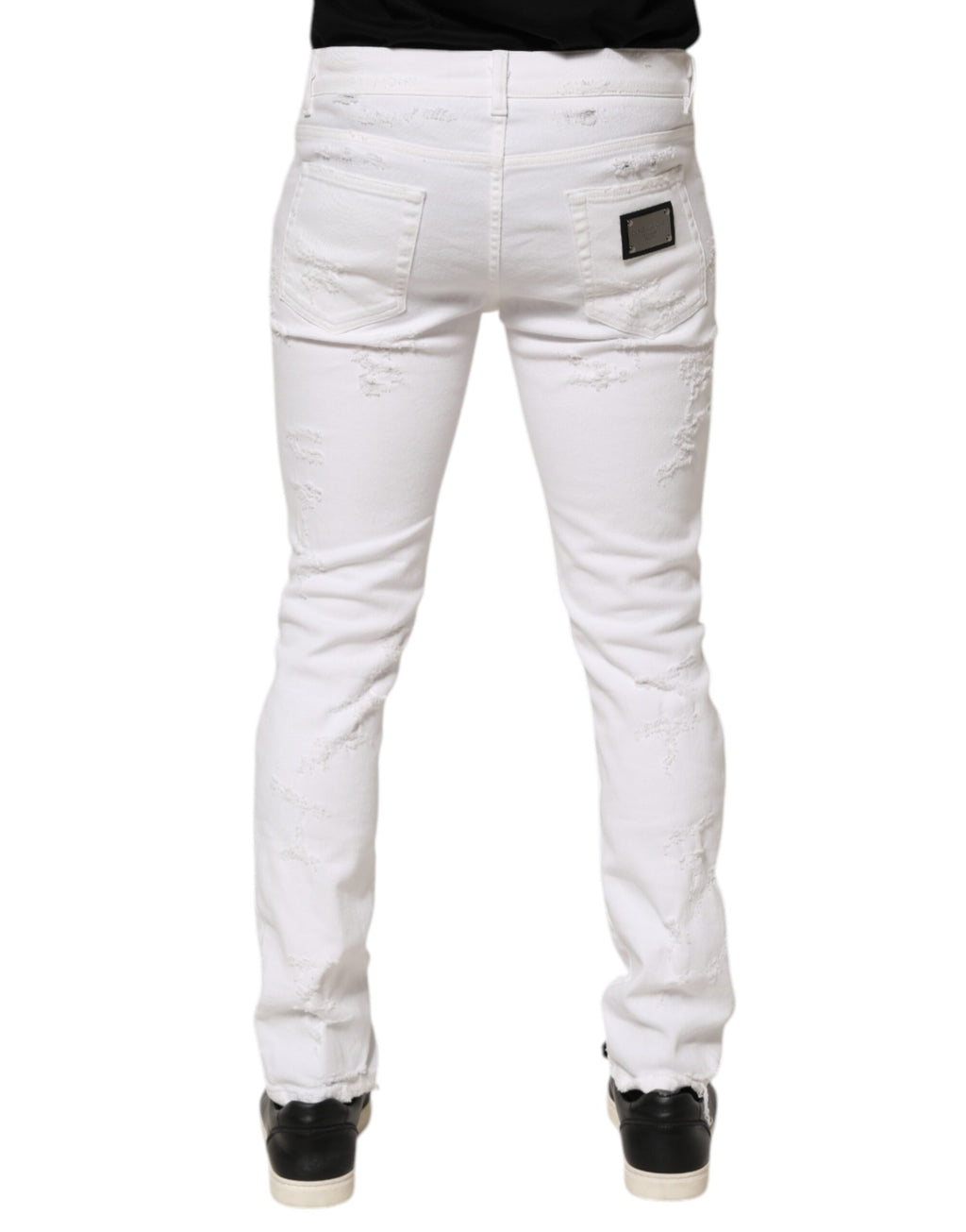 Jean homme Dolce & Gabbana blanc déchiré en denim usé, style décontracté avec déchirures et finition distressed.