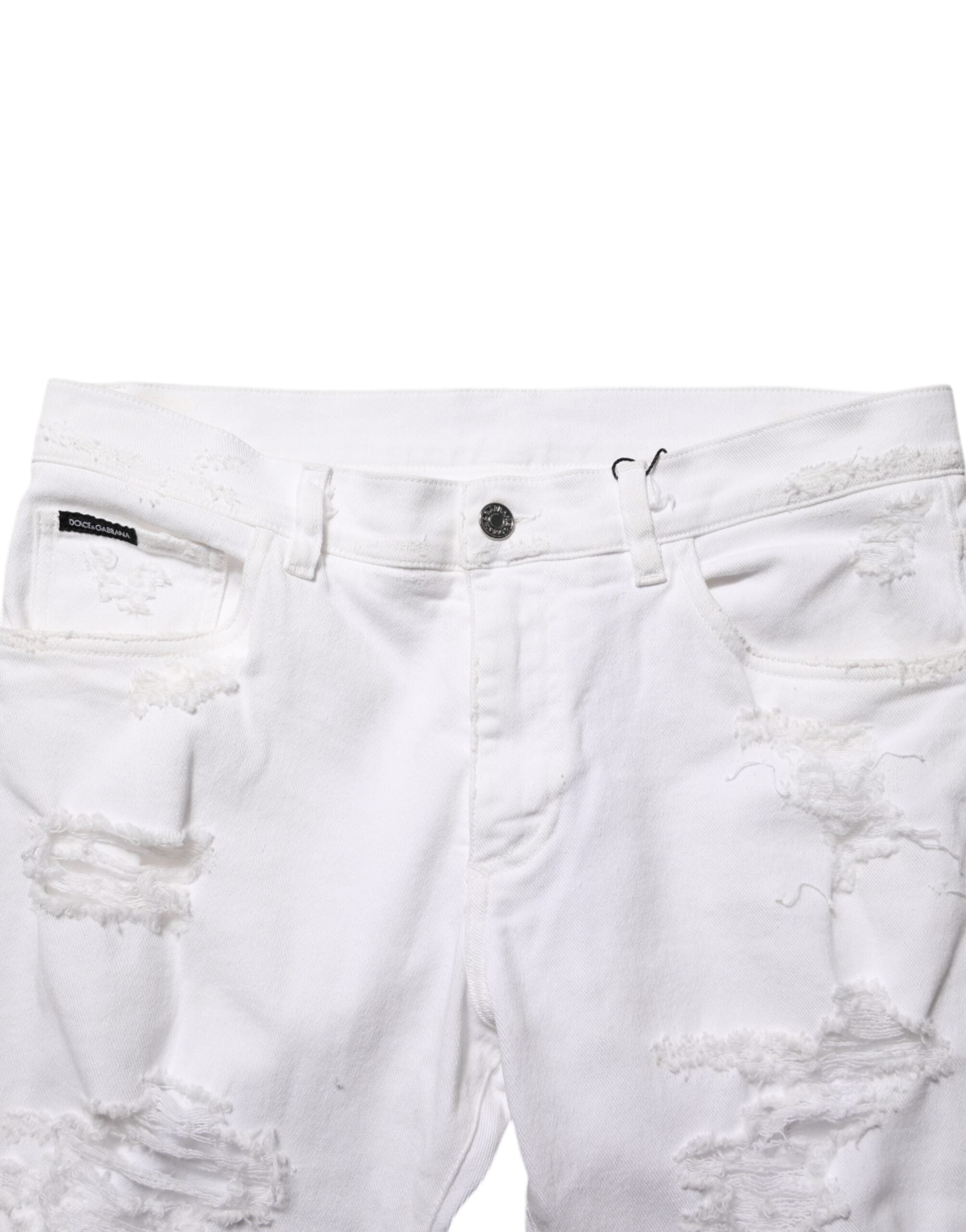 Jean homme Dolce & Gabbana blanc déchiré en denim délavé avec déchirures et détails usés, style décontracté et tendance.