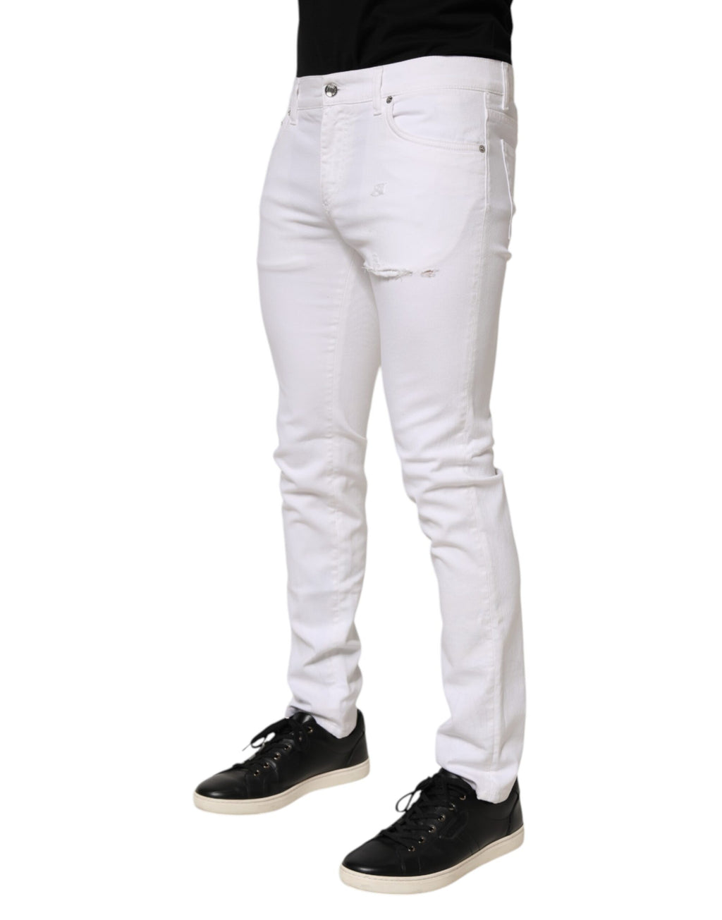 Jeans slim en denim blanc Dolce & Gabbana pour homme avec déchirures et détails en coton, style moderne et tendance.