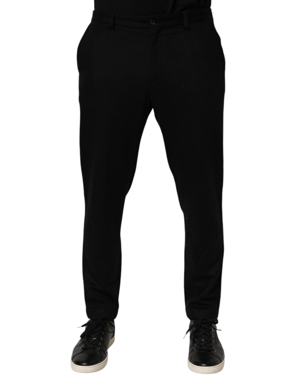 Pantalon habillé en cachemire noir Dolce & Gabbana pour homme, style formel et élégant, porté avec une chemise blanche.