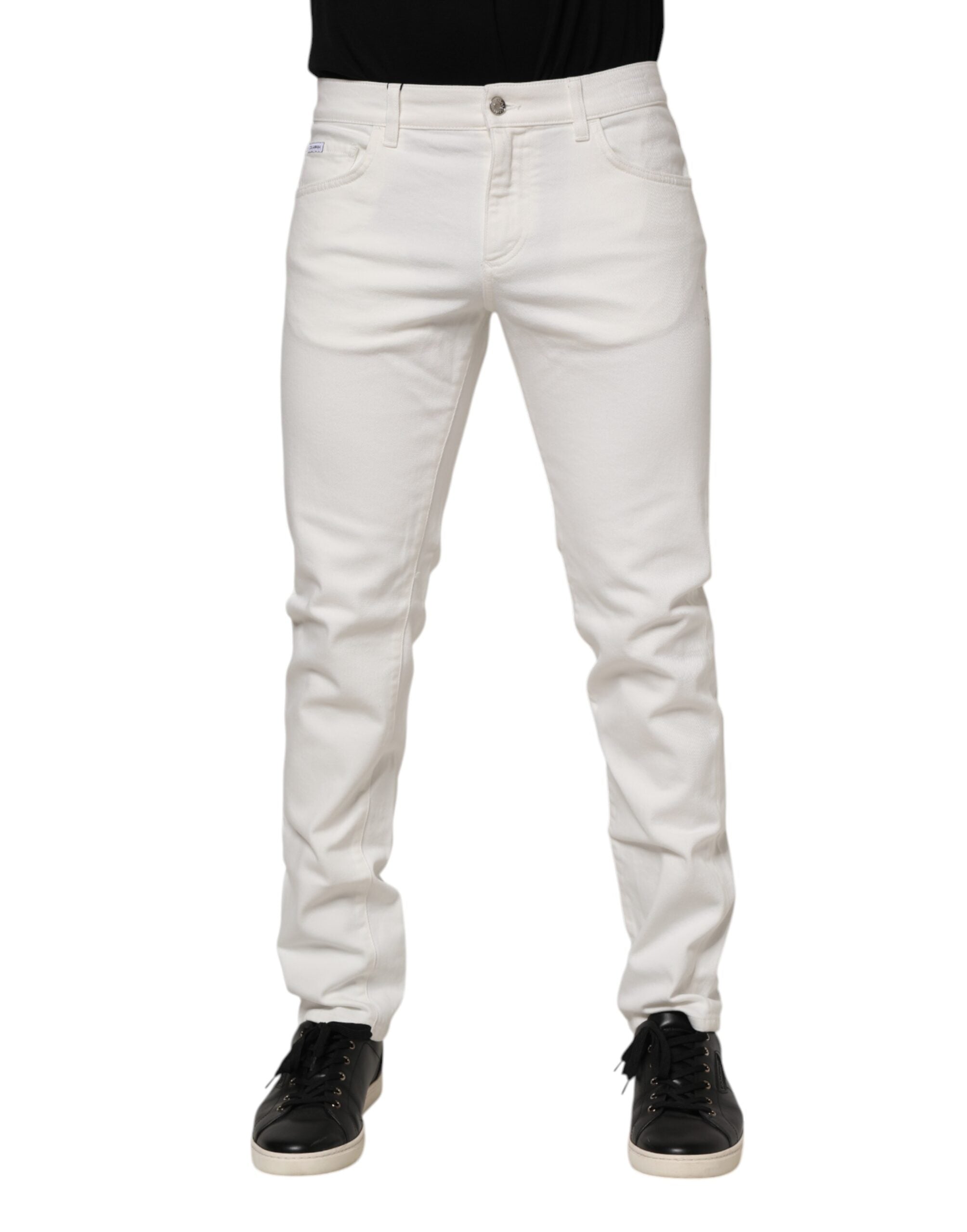 Jeans slim en coton stretch blanc cassé de Dolce & Gabbana, coupe ajustée et détails modernes.