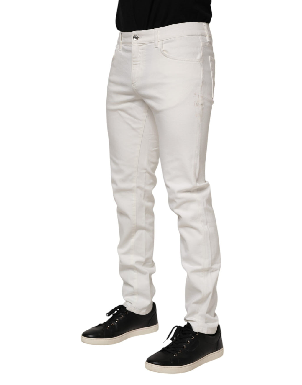 Jeans slim en coton stretch blanc cassé de Dolce & Gabbana, coupe ajustée et détails denim élégants.