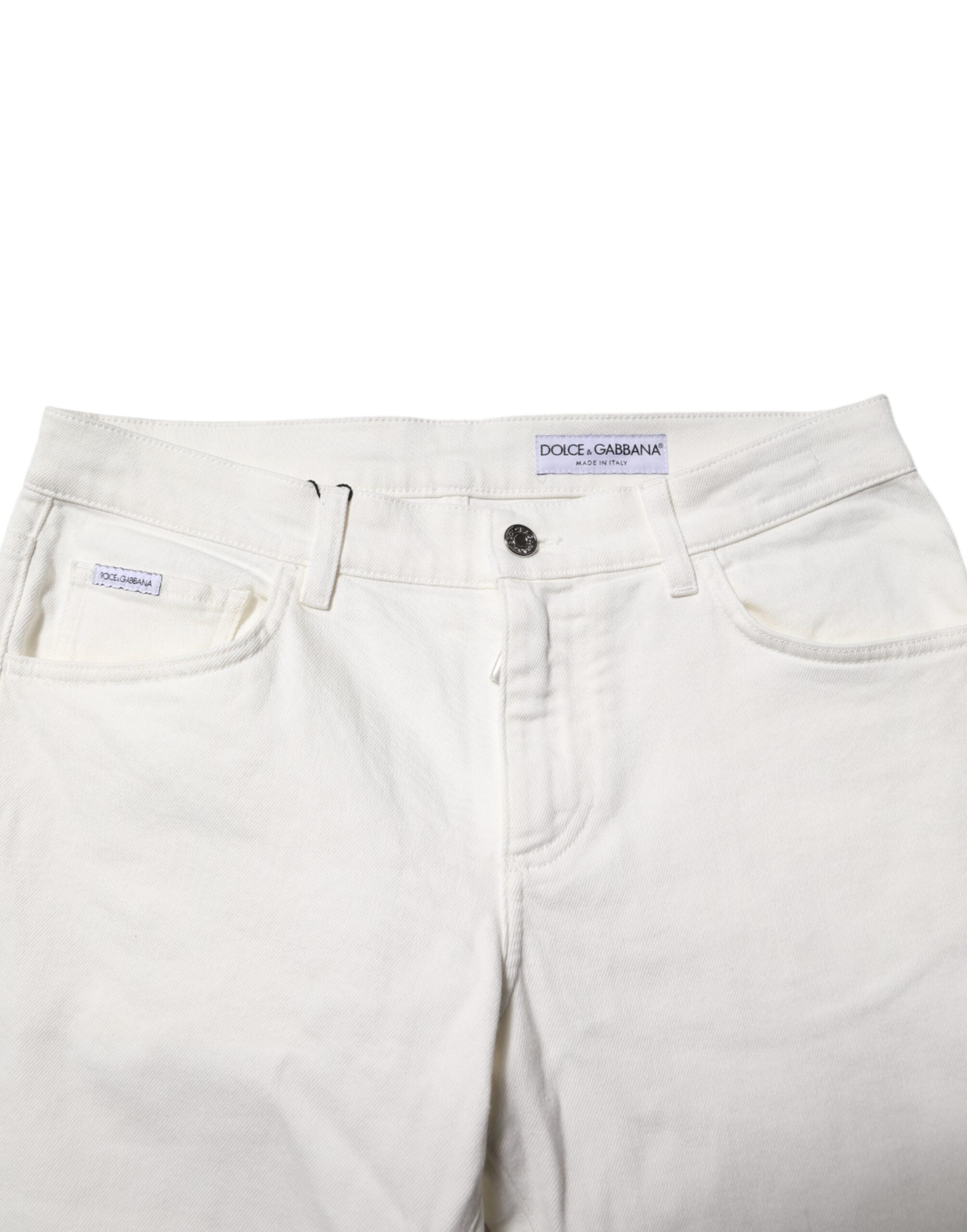 Jeans slim en coton extensible blanc cassé de Dolce & Gabbana, coupe ajustée et détails classiques.