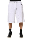 Shorts bermuda décontractés blancs Dolce & Gabbana taille mi-haute avec déchirures, style casual et tendance.