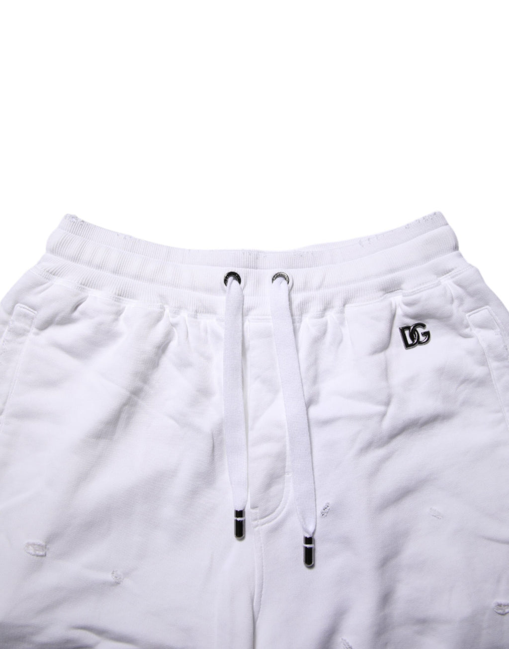 Shorts bermuda déchirés blancs Dolce & Gabbana à taille moyenne pour un style décontracté et tendance.
