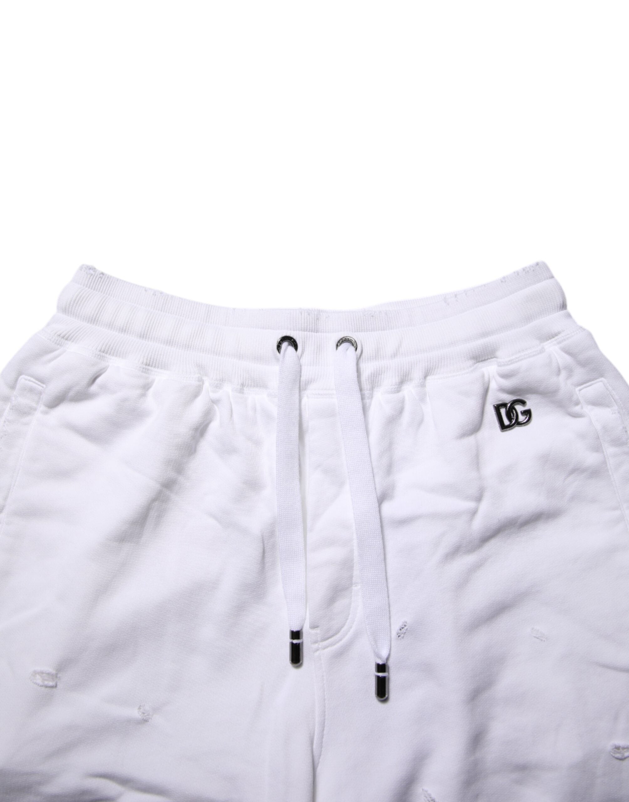 Shorts bermuda déchirés blancs Dolce & Gabbana à taille moyenne pour un style décontracté et tendance.