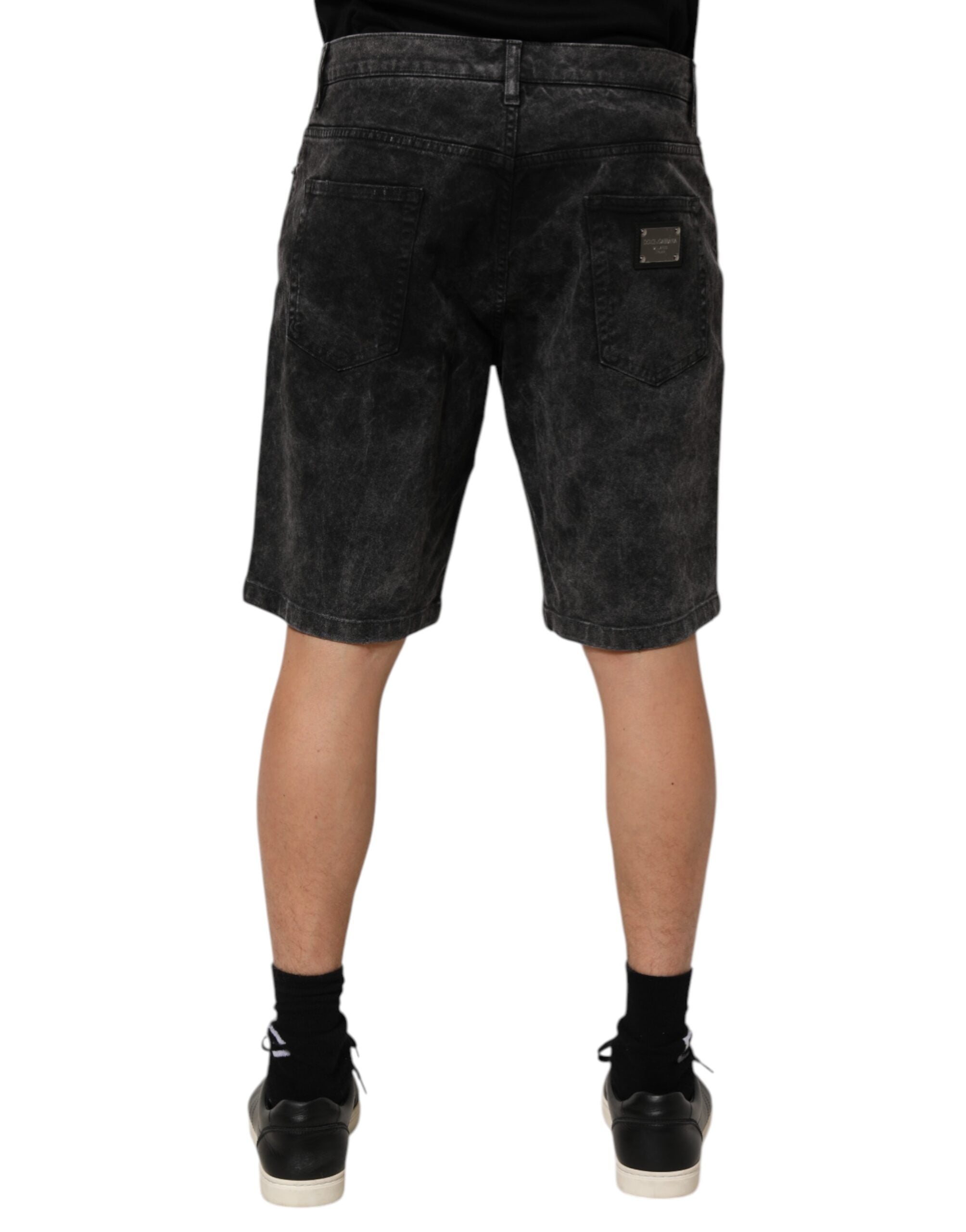 Shorts bermuda pour homme en coton noir Dolce & Gabbana, mi-hauteur à taille moyenne, denim élégant et confortable.