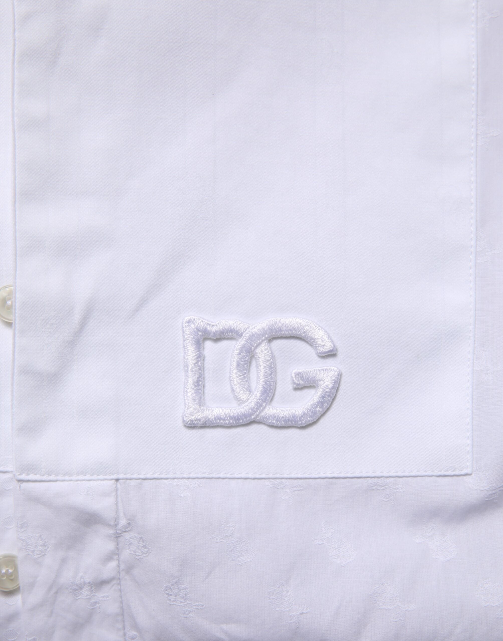 Chemise formelle blanche en coton Dolce & Gabbana Martini Bib, vue de face avec col et boutons visibles.