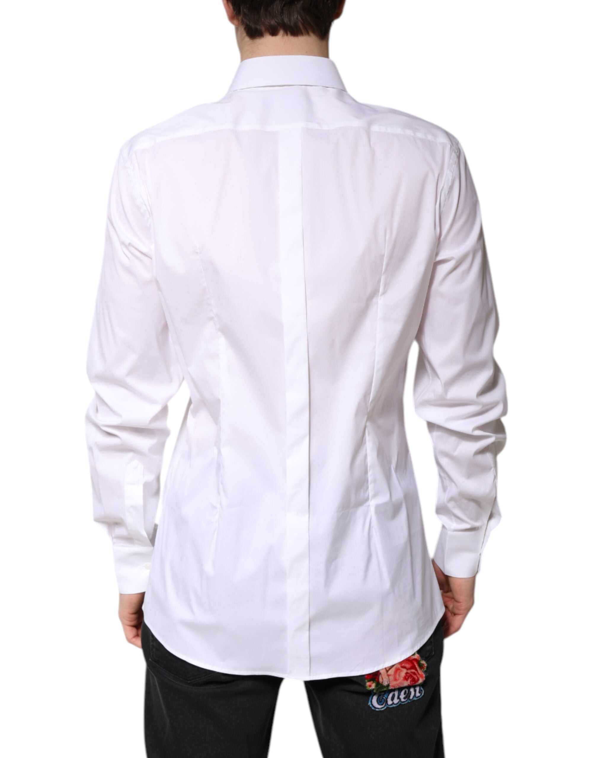 Chemise formelle blanche en coton Dolce & Gabbana avec col, détails dorés visibles sur l'image.