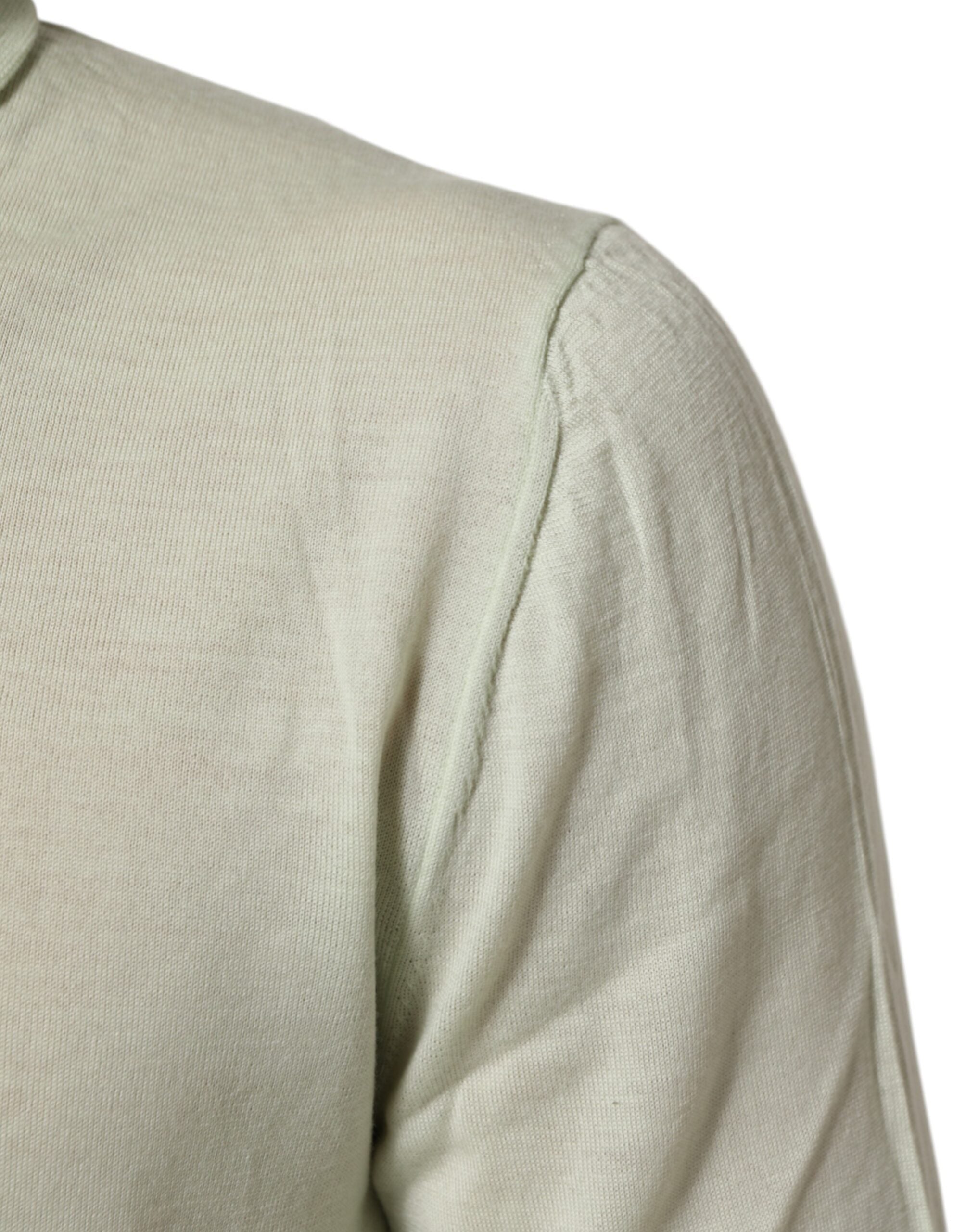 Pull Dolce & Gabbana Light Green avec logo, col roulé, pull-over en maille pour femme, visible en gros plan.