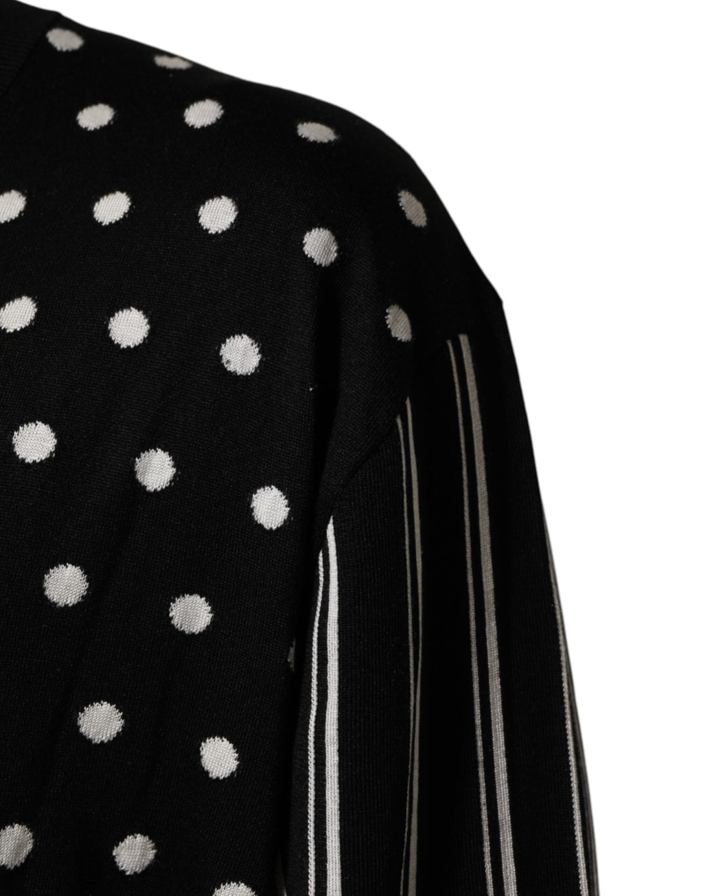 Pull-over Dolce & Gabbana à rayures noires et blanches avec motifs à pois et col en V, en laine ou coton.