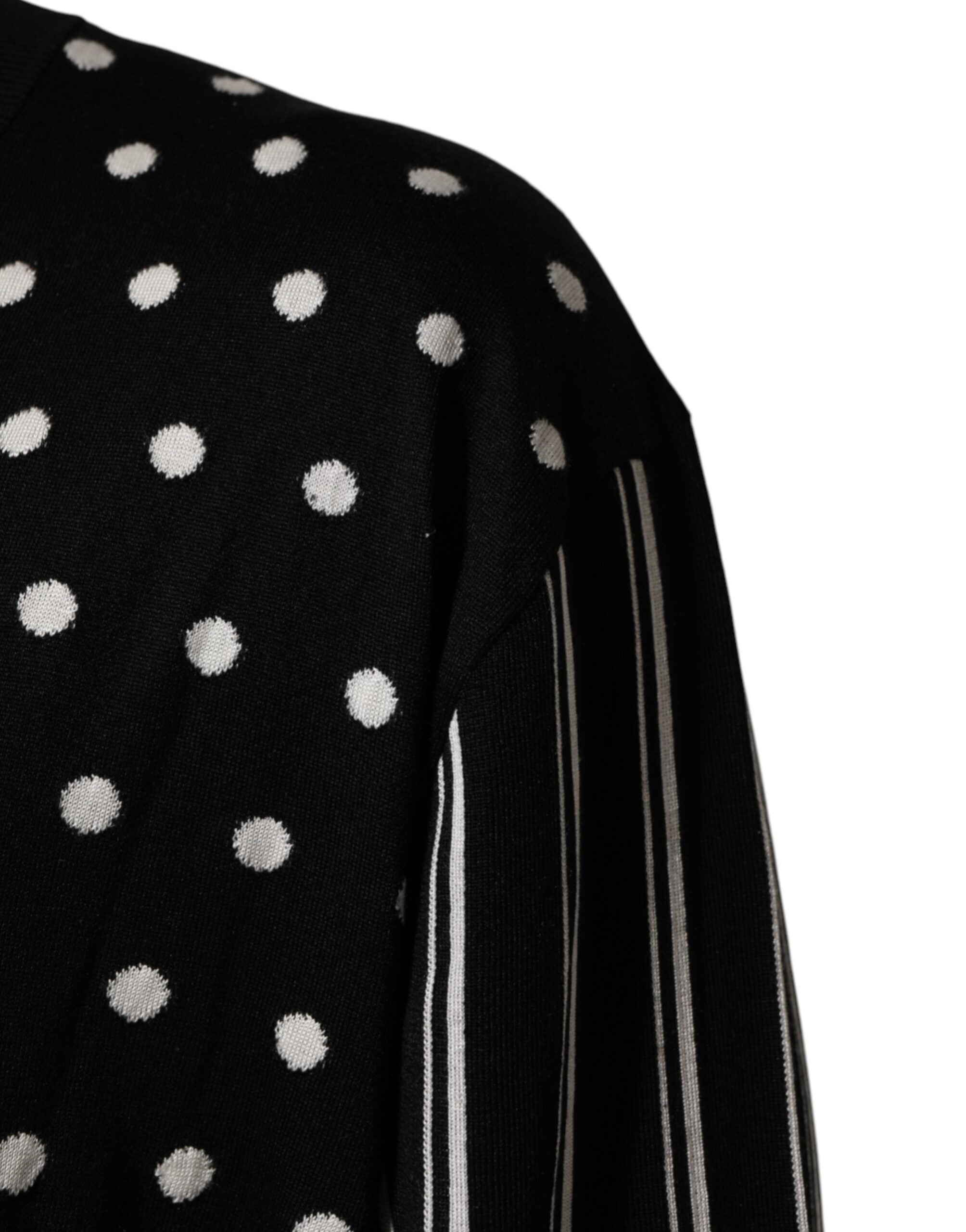 Pull-over Dolce & Gabbana à rayures noires et blanches avec motifs à pois et col en V, en laine ou coton.