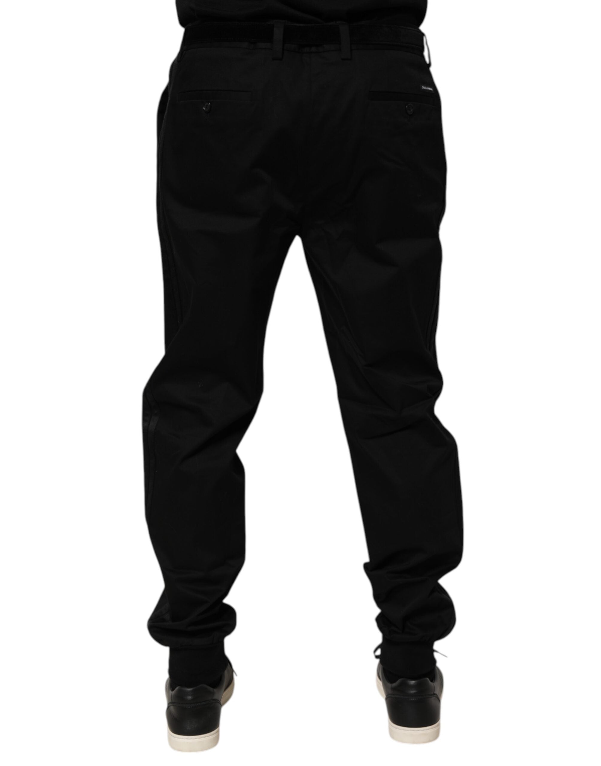 Pantalon décontracté en coton stretch noir de Dolce & Gabbana, style casual avec coupe élégante et détails modernes.
