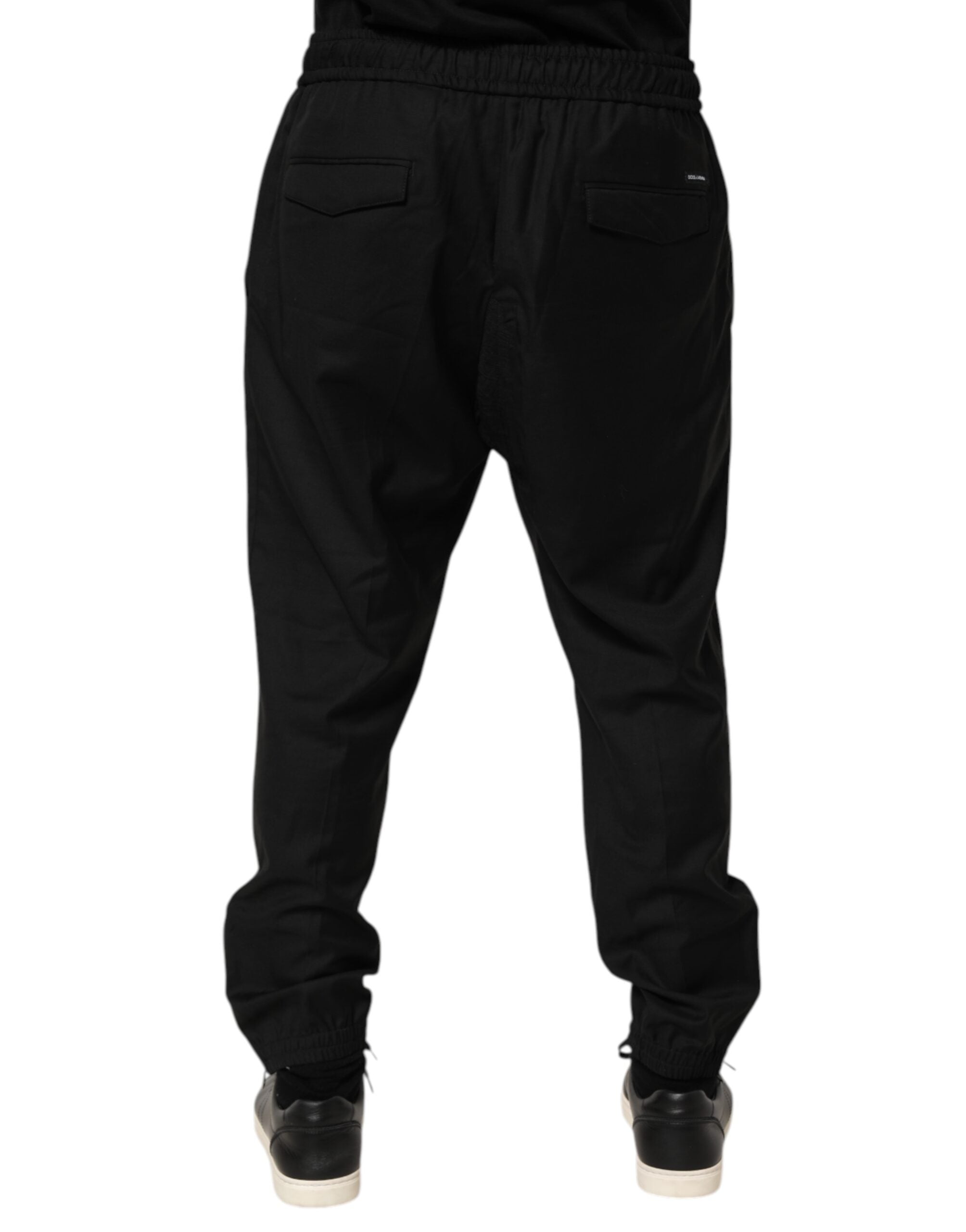 Pantalon de jogging noir pour homme Dolce & Gabbana avec cordon de serrage et coupe décontractée, vue de face.