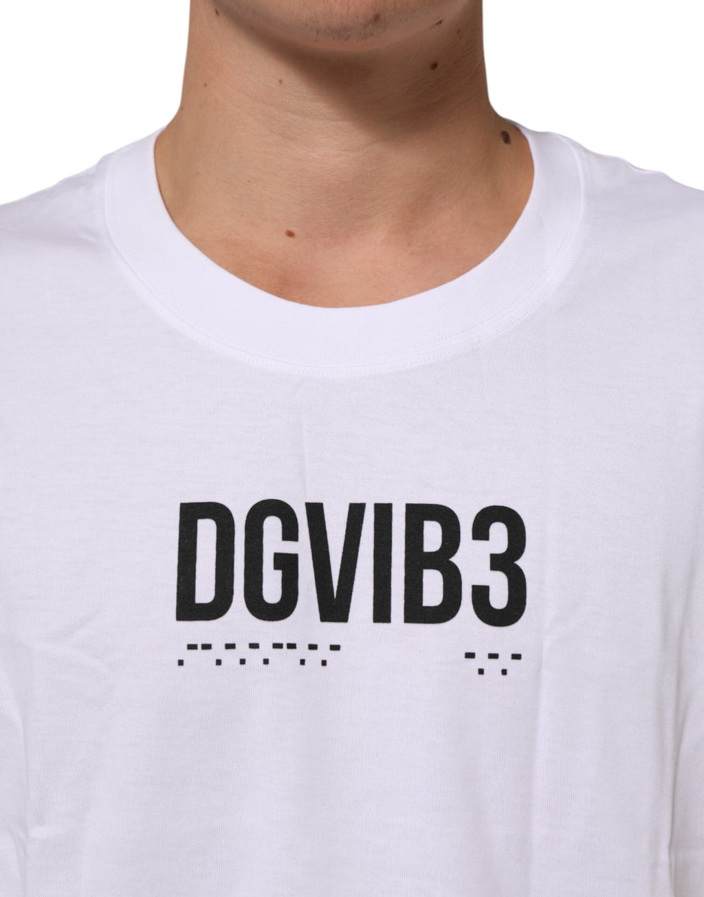 T-shirt sans manches en coton blanc imprimé de Dolce & Gabbana, haut décontracté avec motif élégant.