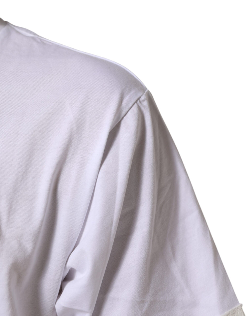 T-shirt blanc en coton Dolce & Gabbana avec impression graphique, col rond et design tendance visible sur l'image.