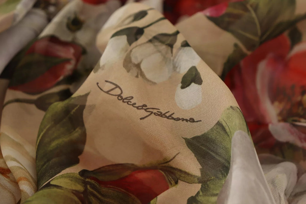 Robe courte beige à fleurs sans manches de Dolce & Gabbana, coupe en A, style élégant et floral.