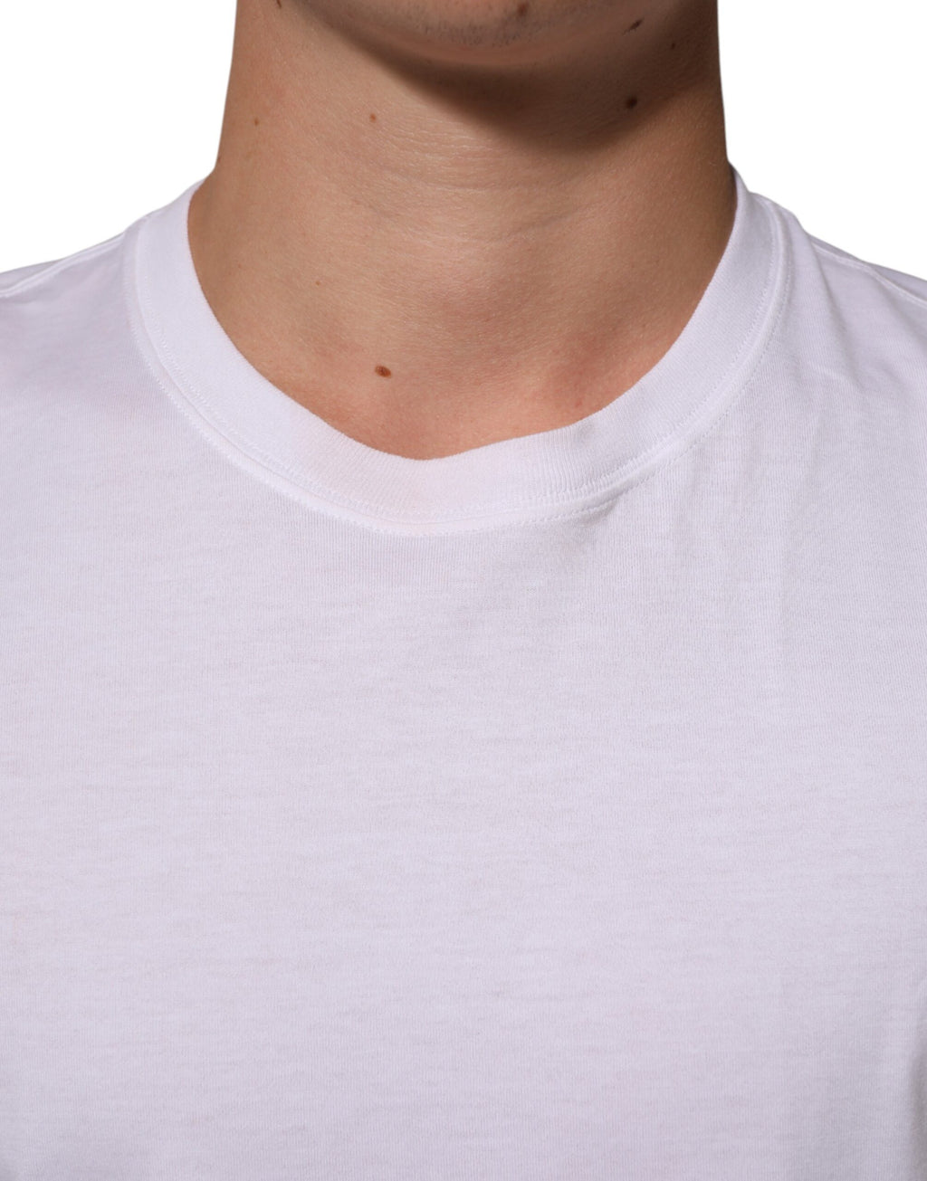 T-shirt blanc en coton pour homme Dolce & Gabbana avec motif d'ange au col rond, style décontracté et élégant.