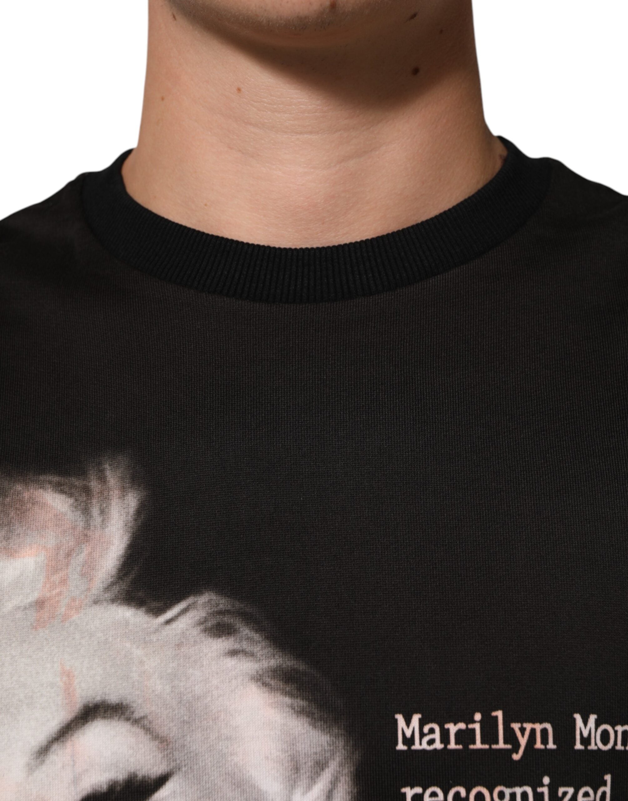 T-shirt noir Dolce & Gabbana Marilyn Monroe en coton à col rond, détail graphique visible sur l'image.