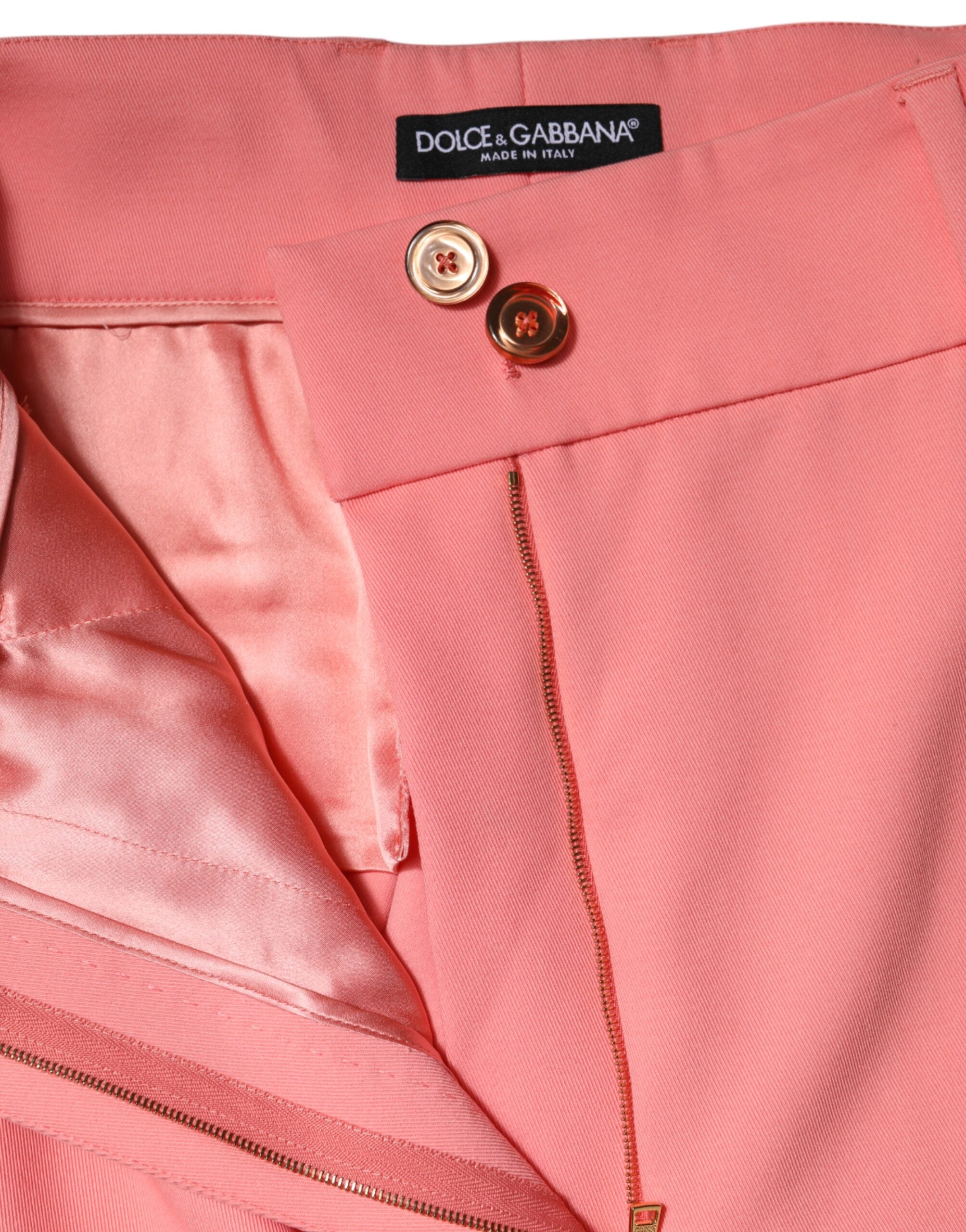 Pantalon tapered rose Dolce & Gabbana à taille haute, style élégant et moderne, en tissu fluide.