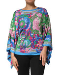 Tunique blouse Dolce & Gabbana à fleurs multicolores imprimées, style élégant et féminin, vue de face.