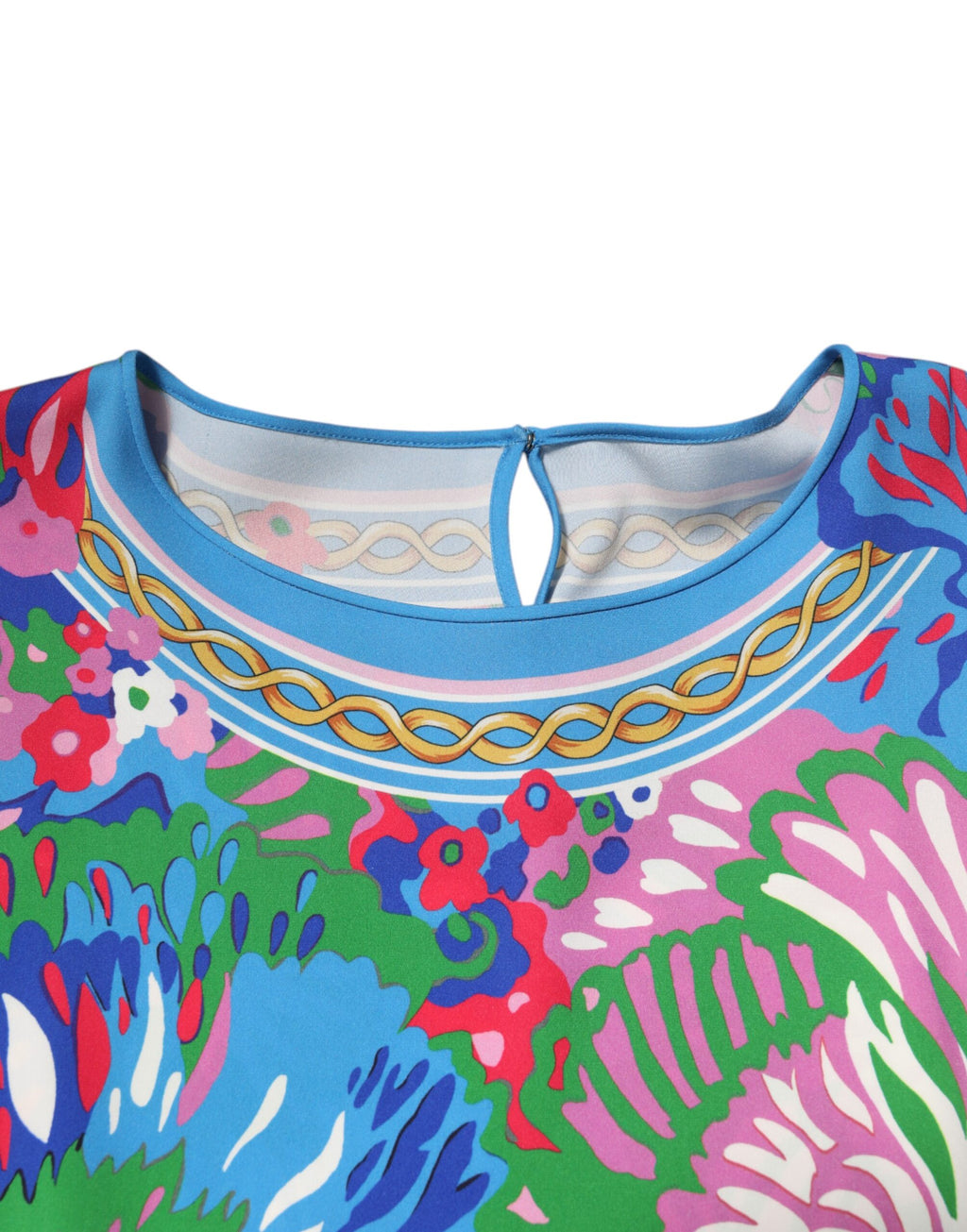 Tunique Dolce & Gabbana à fleurs multicolores avec imprimé floral, blouse légère et élégante, portée décontractée.