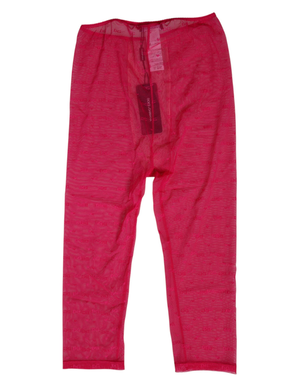 Sous-vêtements Dolce & Gabbana en dentelle rose fuchsia avec logo, coupe ajustée et mi-longue, visibles à l’image.