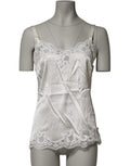 Haut de lingerie Dolce & Gabbana en dentelle florale blanche, sans manches, avec détails délicats et finition élégante.