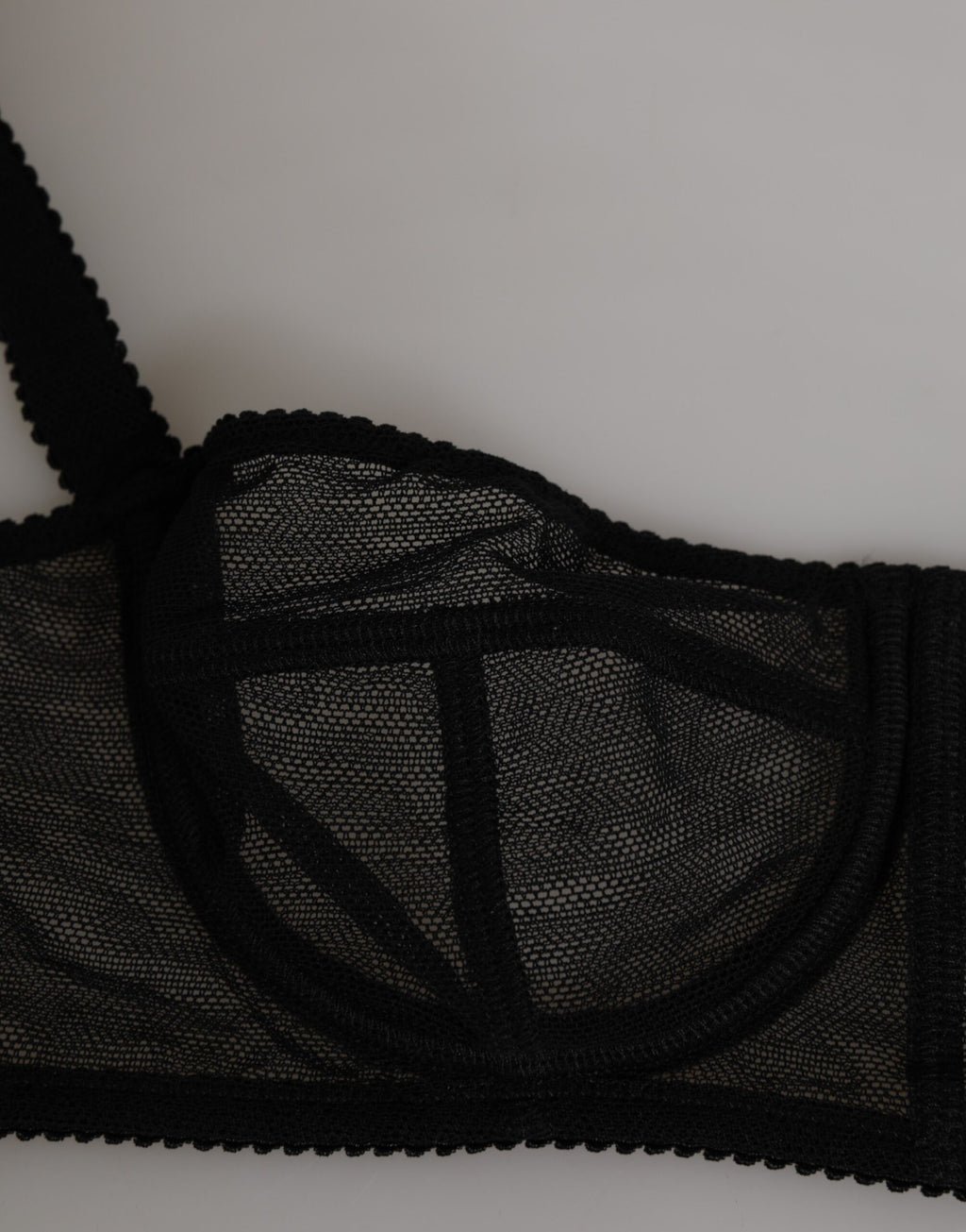 Soutien-gorge balconnet noir à fleurs Dolce & Gabbana, à armatures, lingerie élégante avec motifs floraux.