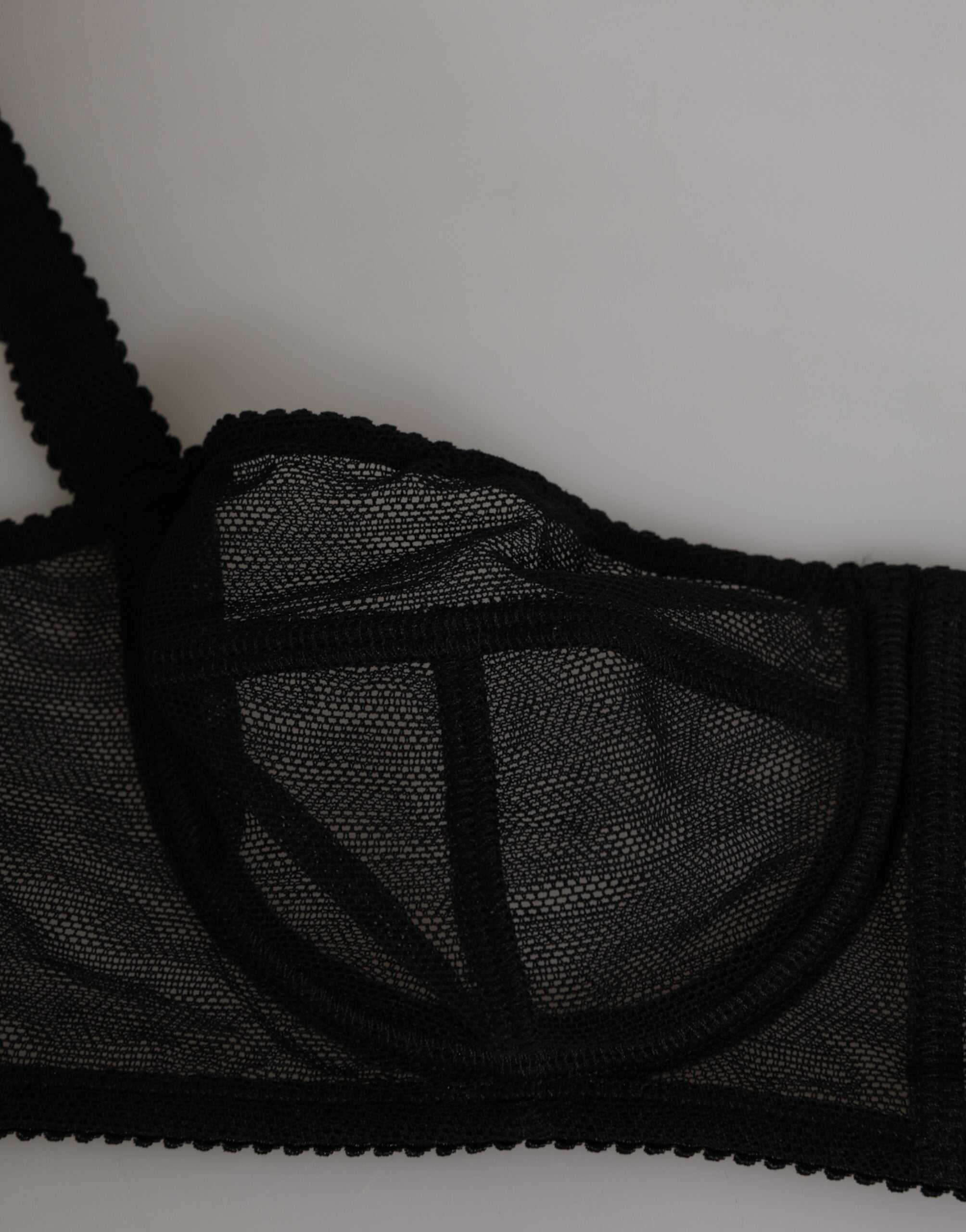 Soutien-gorge balconnet noir à fleurs Dolce & Gabbana, à armatures, lingerie élégante avec motifs floraux.