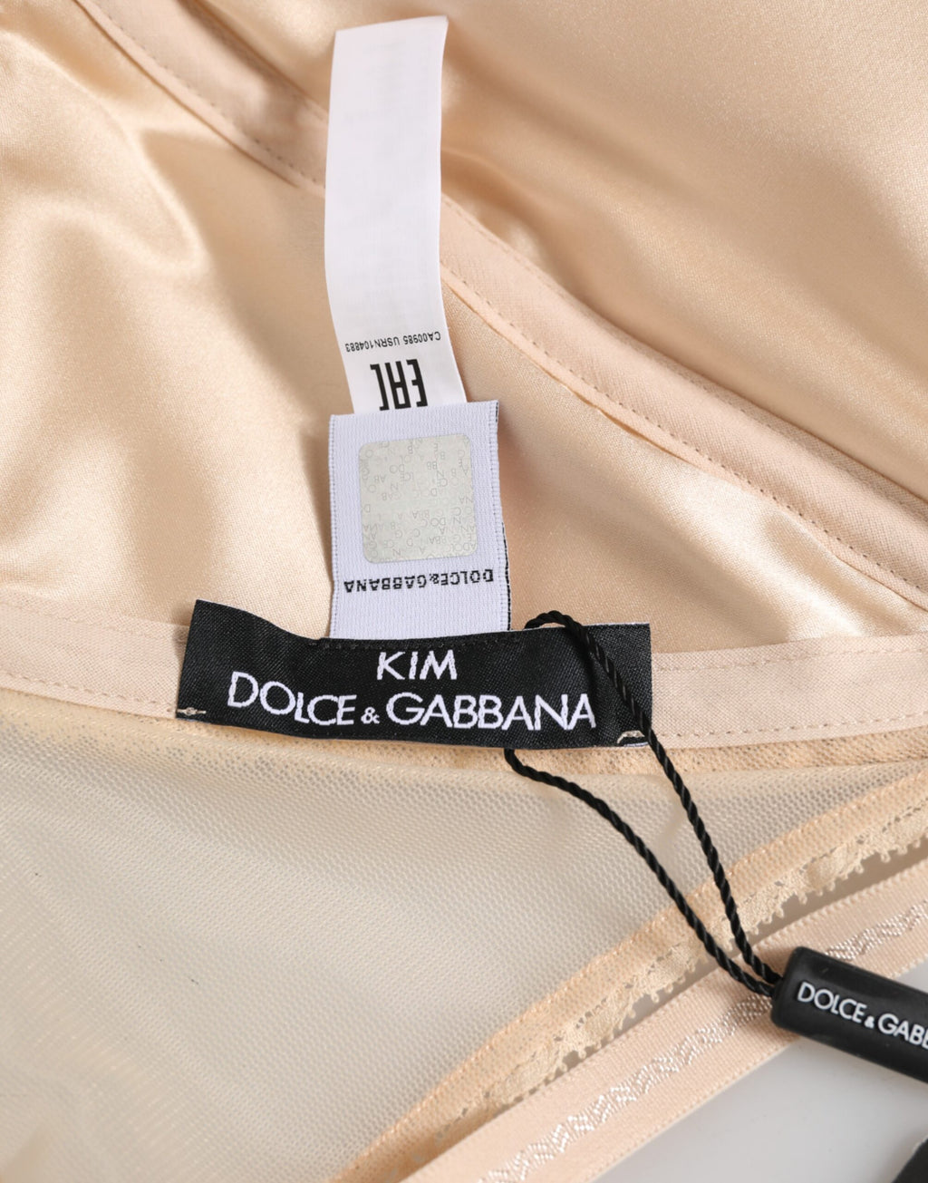 Soutien-gorge triangle en nylon beige Dolce & Gabbana avec cups souples, sous-vêtements élégants et confortables.