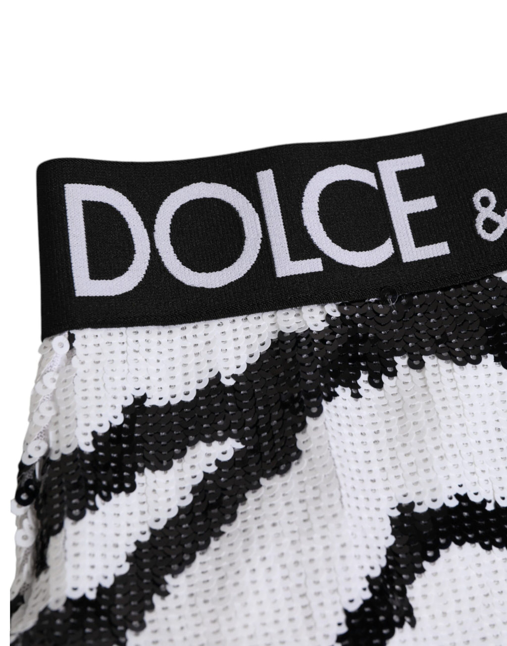 Culotte haute Dolce & Gabbana noire et blanche avec sequins, sous-vêtements élégants en tissu brillant et taille haute.