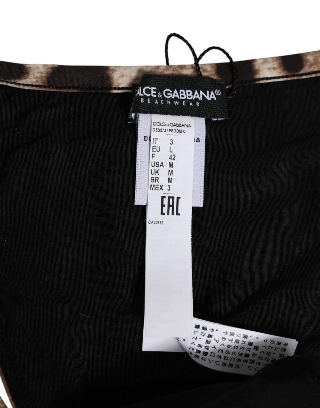 String thong en tanga marron à motif léopard de Dolce & Gabbana, avec design triangle et tissu léger.
